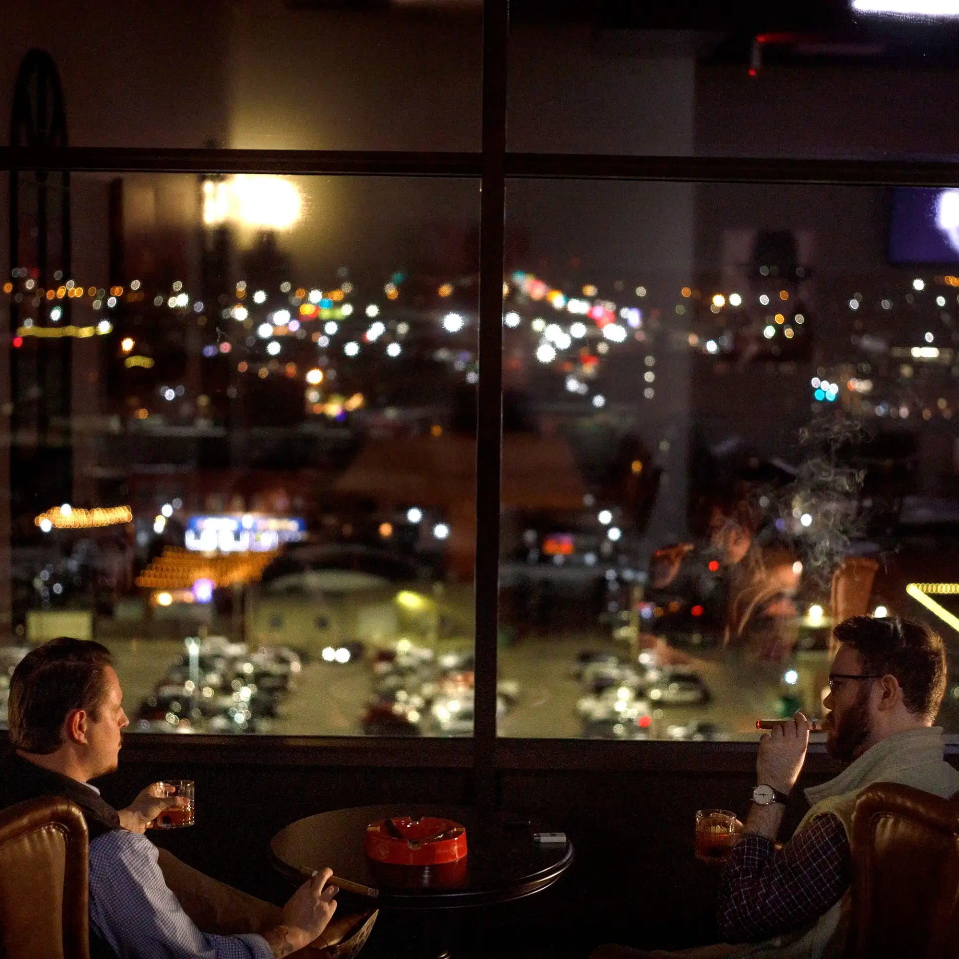 A Place to Unwind2.1 Members enjoying cigars at Cloud 9 Wichita